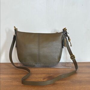 Fossil Green Crossbody Bag with Adjustable Strap and Minimalist Design